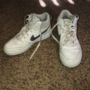 cream nike high tops